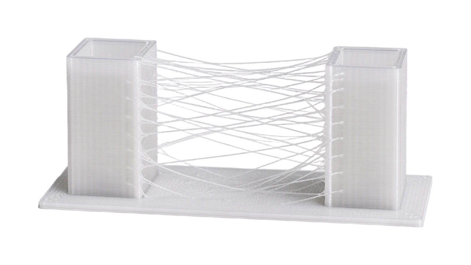 Stringing test with thin plastic strands between two towers