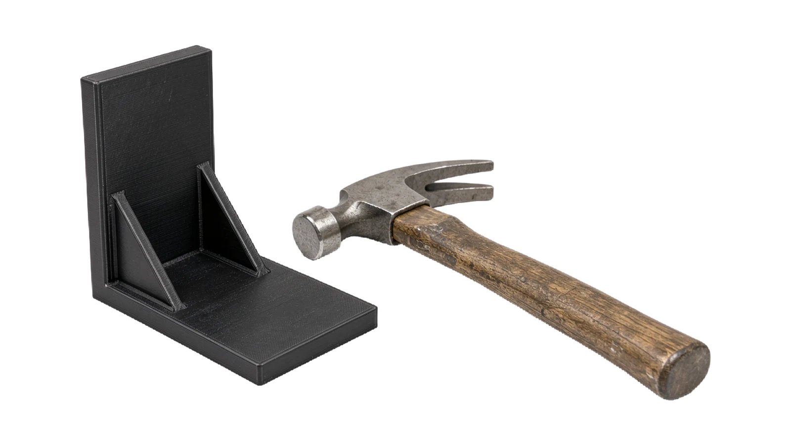 Black ABS bracket next to a hammer